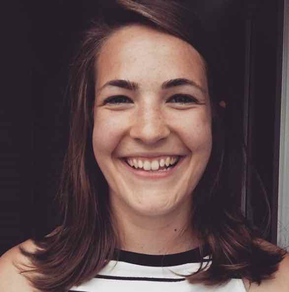 A woman smiling for the camera