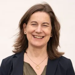 A close-up of a person smiling