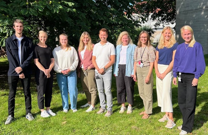 A group of people posing for a photo