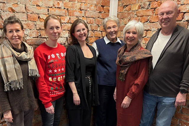 A group of people posing for a photo